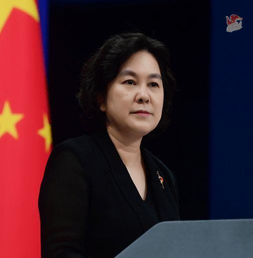 华春莹上传中美外长握手照：望两国重回巴厘岛元首会晤共识