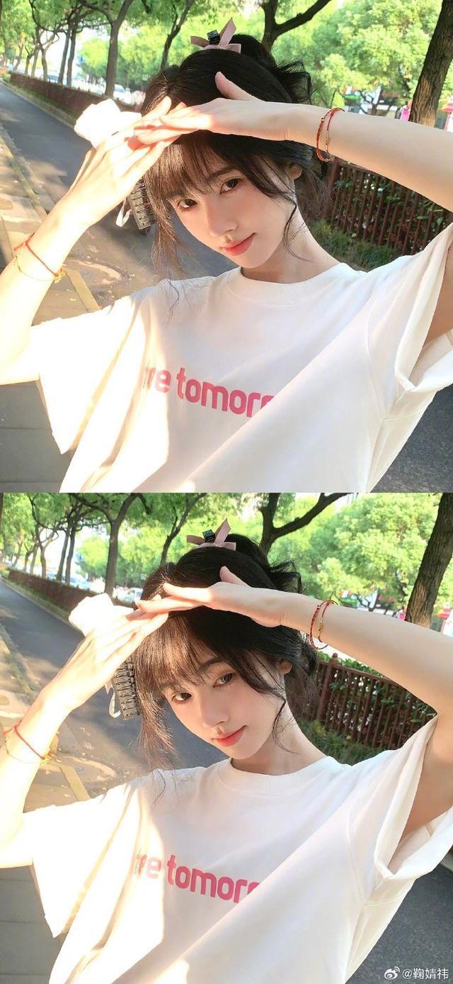 鞠婧祎晒沉浸式遛弯照 空气刘海蝴蝶结发饰可爱似女大学生