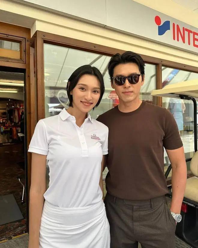 玄彬瑞士出席活动，被众女星抢着一起合影，留背头很帅气