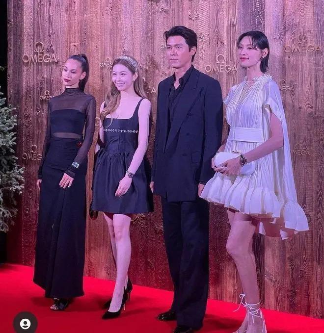 玄彬瑞士出席活动，被众女星抢着一起合影，留背头很帅气