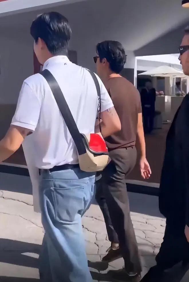 玄彬瑞士出席活动，被众女星抢着一起合影，留背头很帅气