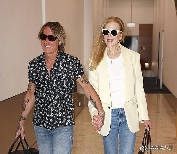 妮可·基德曼两个女儿走机场，肤白貌美亭亭玉立，老父亲乐坏了